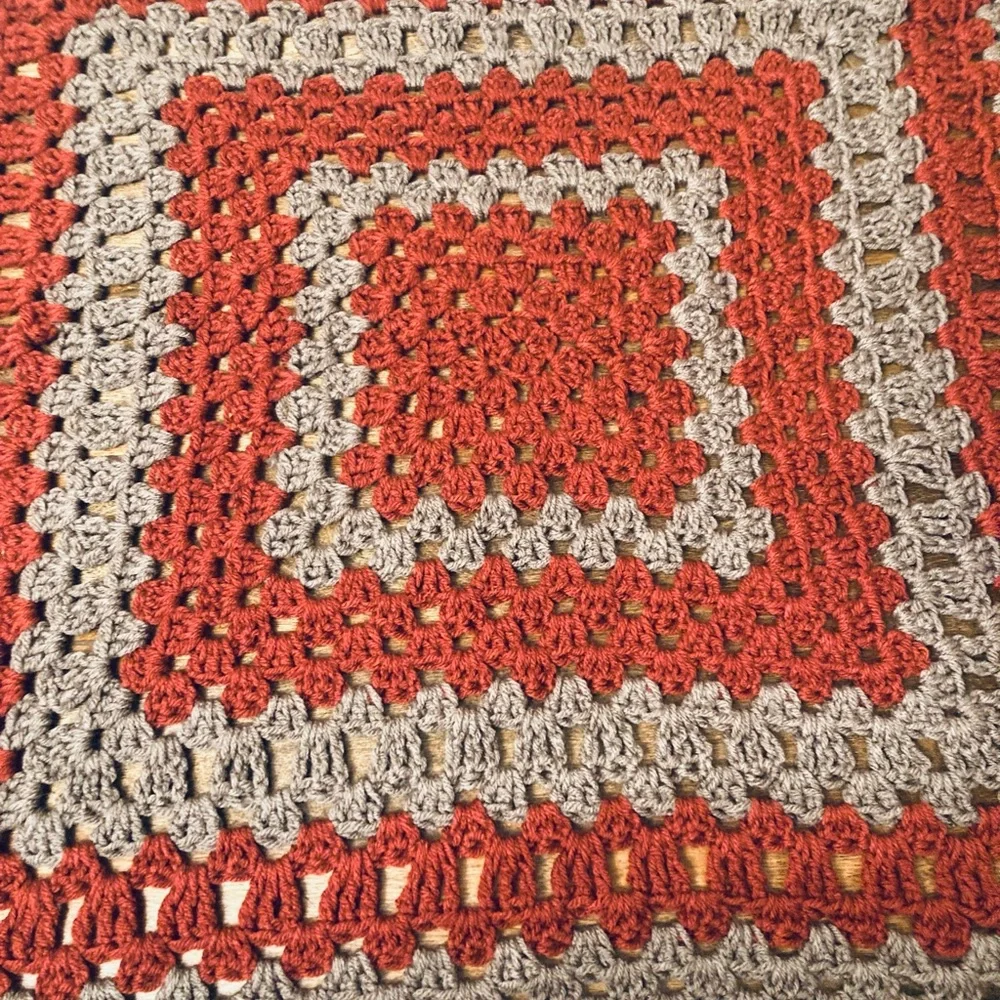 Vintage hand made retro burnt orange and grey knitted crochet granny table cover